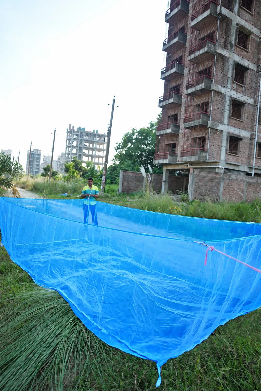 Bright Blue Mesh Net at Construction Site